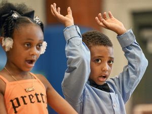 Student waves