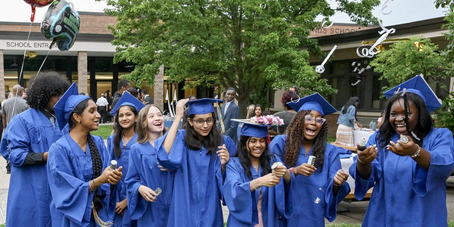 Students celebrate after graduation