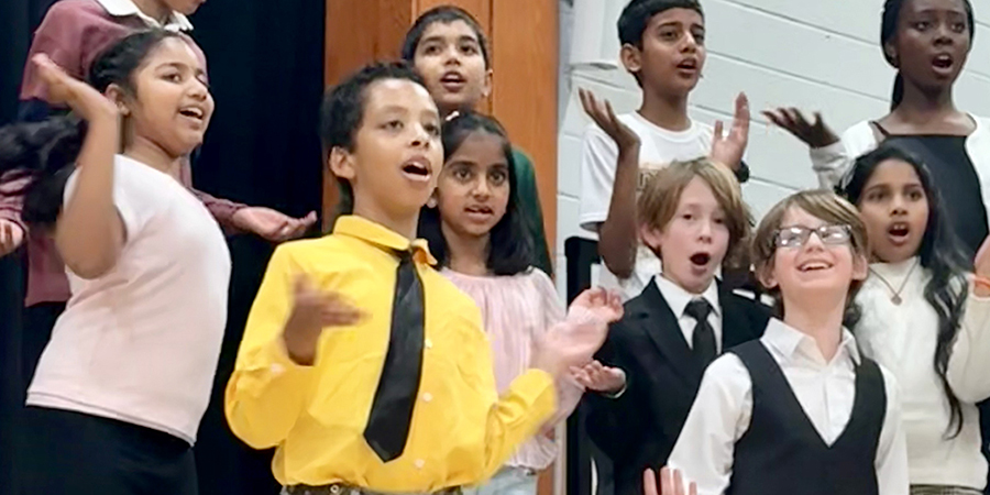 Students sing during a concert