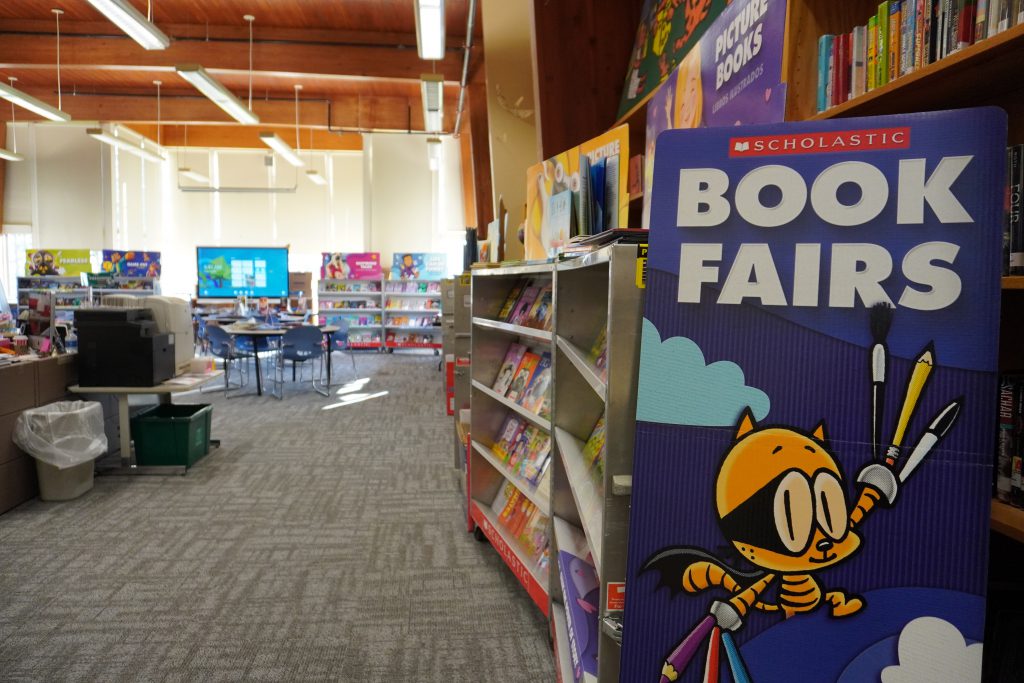 District book fair room showing book fairs sign