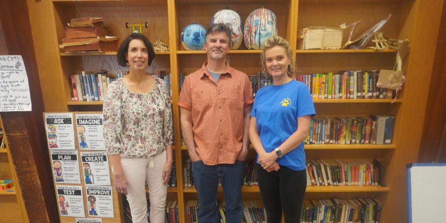 Mrs. Ford Mr. Preller and Mrs. Malkiewicz in the Library