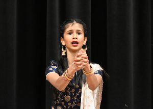  A student dances in traditional Indian garb