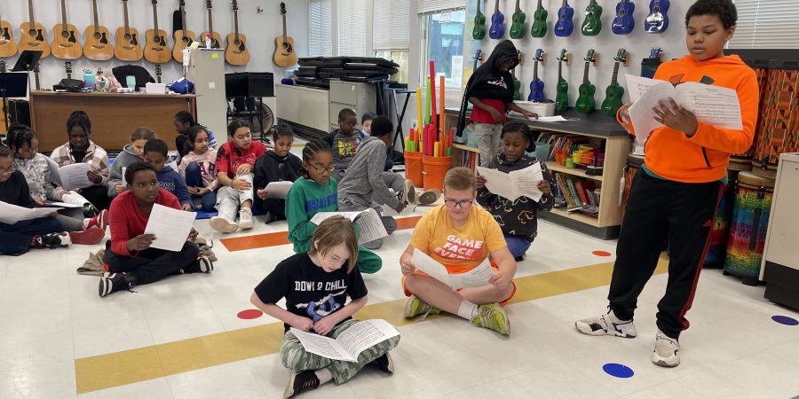 students singing in music class