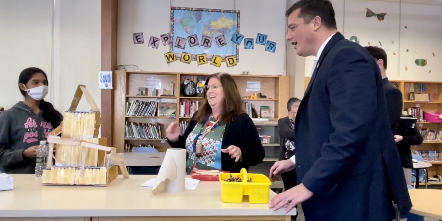 student shows teacher and senator her marble roll