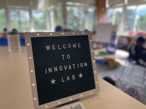 lit up sign saying welcome to innovation lab