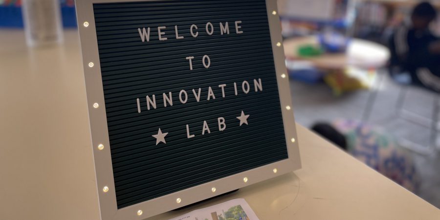 lit up sign saying welcome to innovation lab