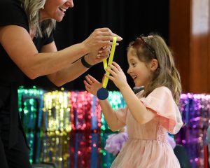 Girl getting a medal
