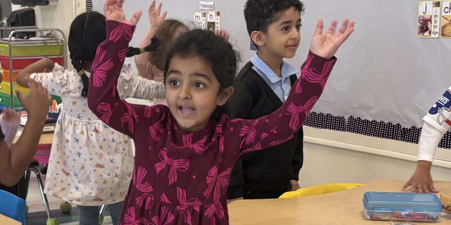 Student raising her hands
