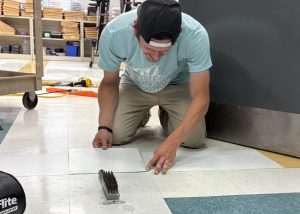 Floor tiles being put down