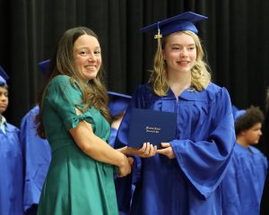 student receives diploma
