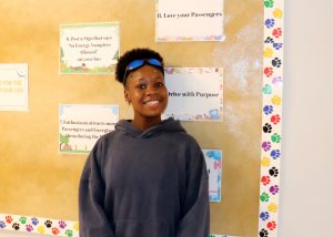 Student posing and smiling