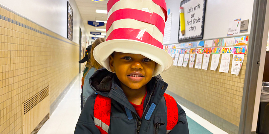 Student wearing a suess hat