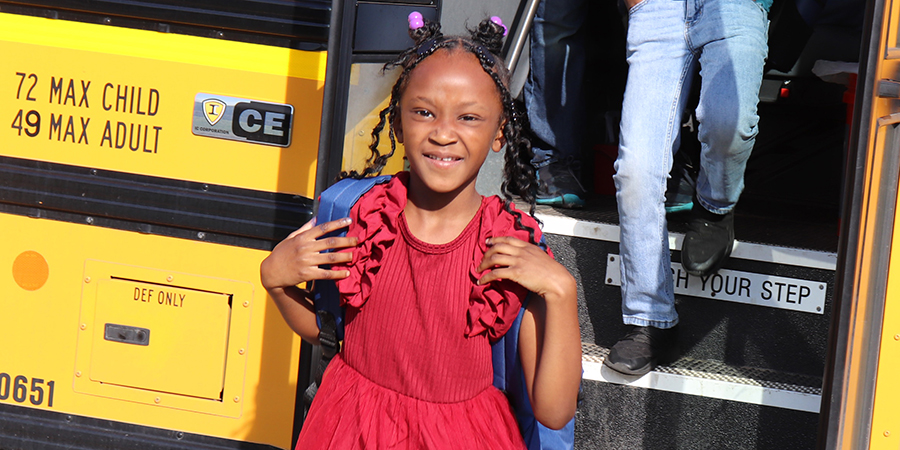 Nyonna_Gr_1_Good2_slider A first grader is ready to start the day.