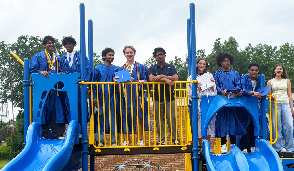 Grads on a jungle jim