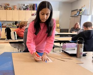 student cutting