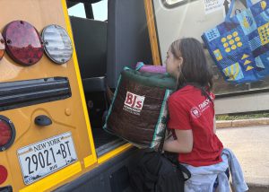 student loading the bus