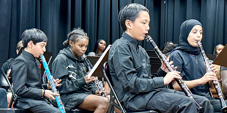Choir members brought holiday cheer to the residents of the Teresian House.
