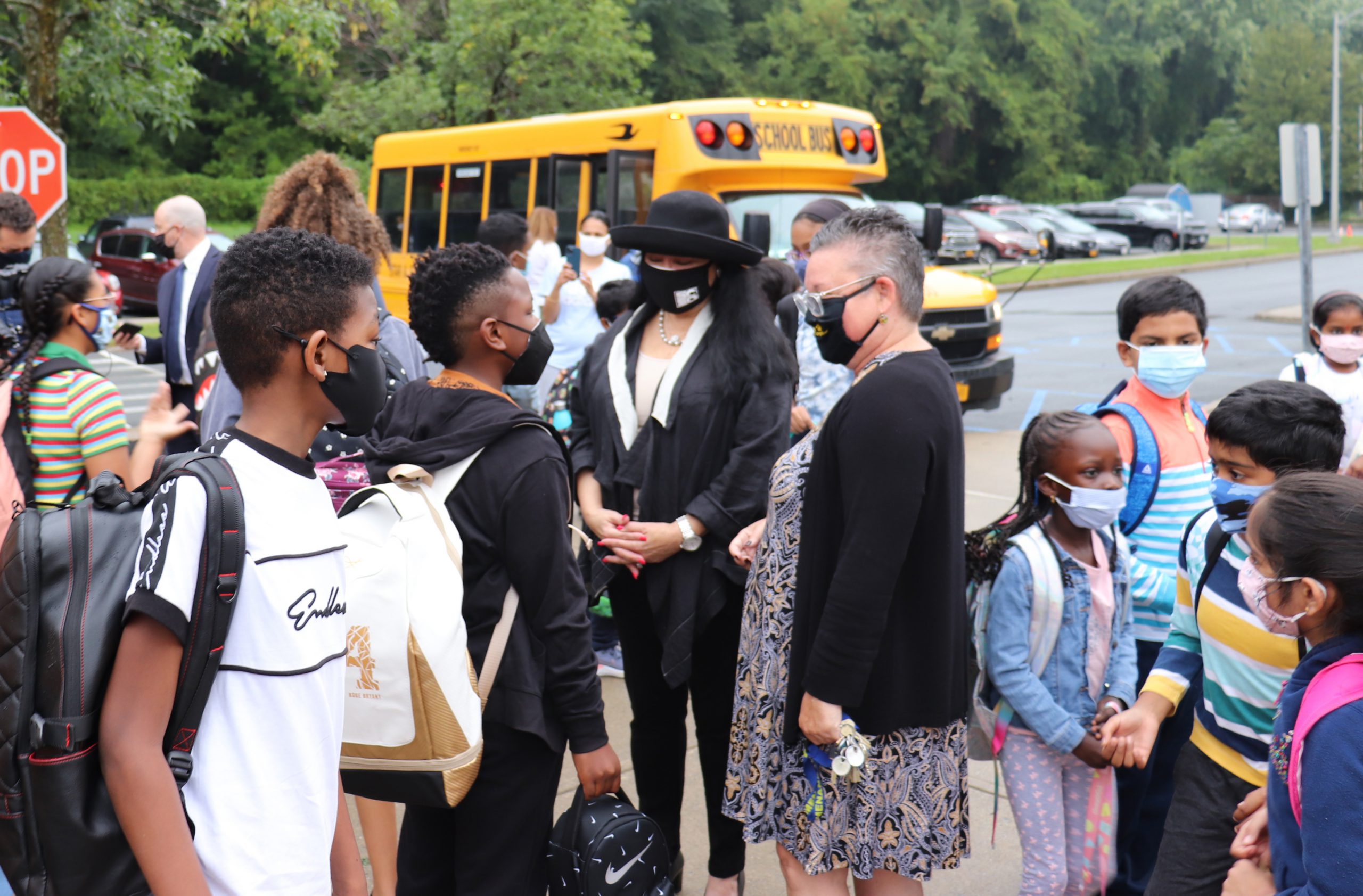 Dr. Betty A. Rosa, Commissioner of NY State Dept. of Education and Dr. Long, Superintendent, greet students on the first day back to school.