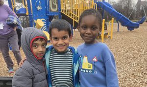 Students pose on the playground